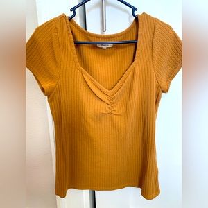 Madewell ribbed tee in burnt orange/mustard yellow in size large